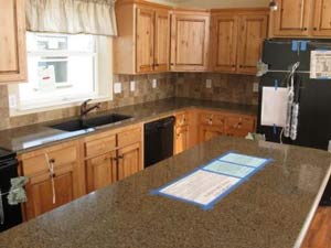 kitchen with granit counter tops, and hard wood floors